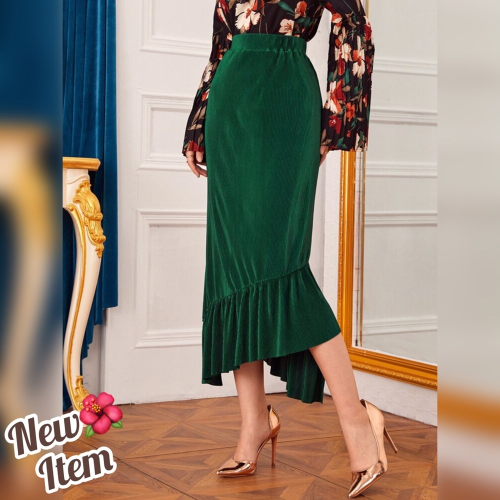 PLEATED ASYMMETRICAL HEM MAXI SKIRT